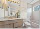 Bright bathroom featuring a vanity and combination tub and shower at 136 Woodmill Rd, Longwood, FL 32779