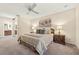 Comfortable bedroom with ceiling fan, floral wall art, and mirrored closet doors at 136 Woodmill Rd, Longwood, FL 32779