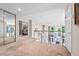 Second floor hallway overlooking the entry foyer, living room, and dining area at 136 Woodmill Rd, Longwood, FL 32779