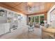 Inviting living room with built-in shelving, large windows, and comfortable seating at 136 Woodmill Rd, Longwood, FL 32779