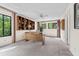 Comfortable home office with custom shelving and scenic outdoor views at 136 Woodmill Rd, Longwood, FL 32779