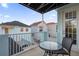 Private balcony with table and chairs, offering outdoor space at 1400 Titian Ct, Reunion, FL 34747