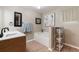 Elegant bathroom with double vanity, soaking tub and separate shower at 149 Pine Rustle Ln, Auburndale, FL 33823