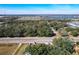 Aerial view of property near a road and lake at 1968 Berkley Rd, Auburndale, FL 33823