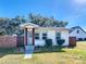 Recently updated home exterior with attractive landscaping at 1968 Berkley Rd, Auburndale, FL 33823