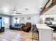Living room features hardwood floors, comfy seating, and an open layout at 1968 Berkley Rd, Auburndale, FL 33823