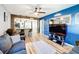 Bright living room with hardwood floors and open kitchen concept at 1968 Berkley Rd, Auburndale, FL 33823