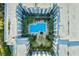 Aerial view showing building with courtyard pool and surrounding landscaping at 206 E South St # 6031, Orlando, FL 32801