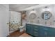 Modern bathroom with dual vanity, updated fixtures, and a shower/tub combo at 206 E South St # 6031, Orlando, FL 32801
