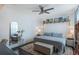 Spacious bedroom with a king-size bed and a ceiling fan at 206 E South St # 6031, Orlando, FL 32801
