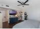 Main bedroom with a large TV, vanity, and walk-in closet at 206 E South St # 6031, Orlando, FL 32801