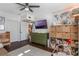 Spacious Bedroom with crib, dresser, and plenty of toy storage at 206 E South St # 6031, Orlando, FL 32801