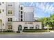 The Grande, upscale apartment building with landscaping at 206 E South St # 6031, Orlando, FL 32801