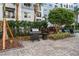 Community grilling area with lush landscaping at 206 E South St # 6031, Orlando, FL 32801