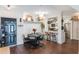 Modern white kitchen with stainless steel appliances and breakfast bar at 206 E South St # 6031, Orlando, FL 32801