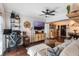 Living room with hardwood floors, comfortable sofa and home office at 206 E South St # 6031, Orlando, FL 32801