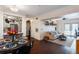 Open living room with hardwood floors and comfortable seating at 206 E South St # 6031, Orlando, FL 32801