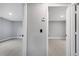 Bright hallway with doors to bedrooms and bath at 272 Iowa Woods W Cir, Orlando, FL 32824