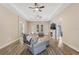Spacious living room with hardwood floors, fireplace, and sectional sofa at 2850 Horton Rd, Kissimmee, FL 34744