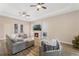 Spacious living room with hardwood floors, fireplace, and sectional sofa at 2850 Horton Rd, Kissimmee, FL 34744