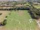 Aerial view of pasture with hay bales and fencing at 2850 Horton Rd, Kissimmee, FL 34744