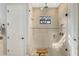 Large walk-in shower with tile surround, built-in seat and window at 2850 Horton Rd, Kissimmee, FL 34744