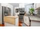 Updated kitchen boasting stainless steel appliances and granite countertops at 2855 Cady Way, Winter Park, FL 32792