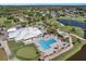 Community overview with pool, clubhouse, and golf course at 2923 Marshfield Ct # Ge, Orlando, FL 32822