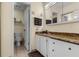 Bathroom boasts granite countertops and updated vanity at 2923 Marshfield Ct # Ge, Orlando, FL 32822