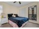 Cozy bedroom with a queen bed and built-in closet at 2923 Marshfield Ct # Ge, Orlando, FL 32822