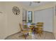 Small breakfast nook with a table and chairs near built-in cabinets at 2923 Marshfield Ct # Ge, Orlando, FL 32822