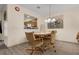 Dining area with a table and chairs, open to the kitchen at 2923 Marshfield Ct # Ge, Orlando, FL 32822