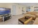 Bright living room featuring a comfy couch and tile floors at 2923 Marshfield Ct # Ge, Orlando, FL 32822