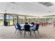 Clubhouse meeting room with tables and chairs at 2923 Marshfield Ct # Ge, Orlando, FL 32822