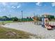 playground with sand and play equipment at 2923 Marshfield Ct # Ge, Orlando, FL 32822