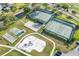 Aerial view of tennis, basketball, and playground at 2923 Marshfield Ct # Ge, Orlando, FL 32822