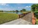 Charming wooden footbridge over a tranquil pond at 2923 Marshfield Ct # Ge, Orlando, FL 32822