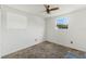 Bedroom with ceiling fan and window with natural light at 2943 Elkcam Blvd, Deltona, FL 32738