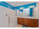 Bathroom with glass shower and double vanity at 306 Quarry Rock Cir, Kissimmee, FL 34758