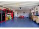 Spacious garage with ample storage and organization at 306 Quarry Rock Cir, Kissimmee, FL 34758