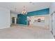Open living space with kitchen views, neutral colors, and a chandelier at 306 Quarry Rock Cir, Kissimmee, FL 34758