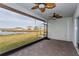 Spacious screened patio overlooking a lake at 306 Quarry Rock Cir, Kissimmee, FL 34758