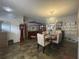 Bright dining room with a chandelier and elegant furnishings at 3109 Surfside Way, Orlando, FL 32805