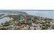 Aerial view showcasing the home's waterfront location and neighborhood at 32650 Azealia Pl, Tavares, FL 32778