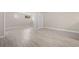 Bright living room featuring hardwood floors and an open floor plan at 32650 Azealia Pl, Tavares, FL 32778