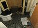 Flooded bathroom with debris and damaged flooring at 3421 Fudge Rd, Apopka, FL 32712