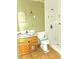 Outdated bathroom featuring a vanity with damaged cabinets and a tiled shower with decorative palm tree accents at 3421 Fudge Rd, Apopka, FL 32712