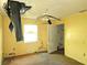 Bedroom with damaged ceiling, hanging debris, and electrical wiring issues; indicating necessary repairs and renovation at 3421 Fudge Rd, Apopka, FL 32712