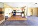 Open kitchen layout, awaiting remodel, offering the chance to design a modern culinary space to your personal specifications at 3421 Fudge Rd, Apopka, FL 32712