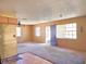 Bright interior with an open layout, offering potential for customization and modern updates to create a cozy living space at 3421 Fudge Rd, Apopka, FL 32712